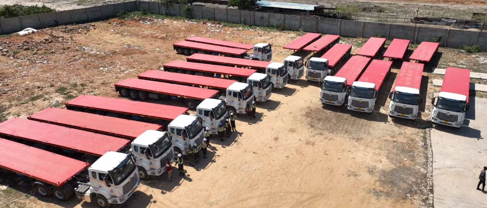 Aerial view of the Hesu trucks and trailers parked at the yard